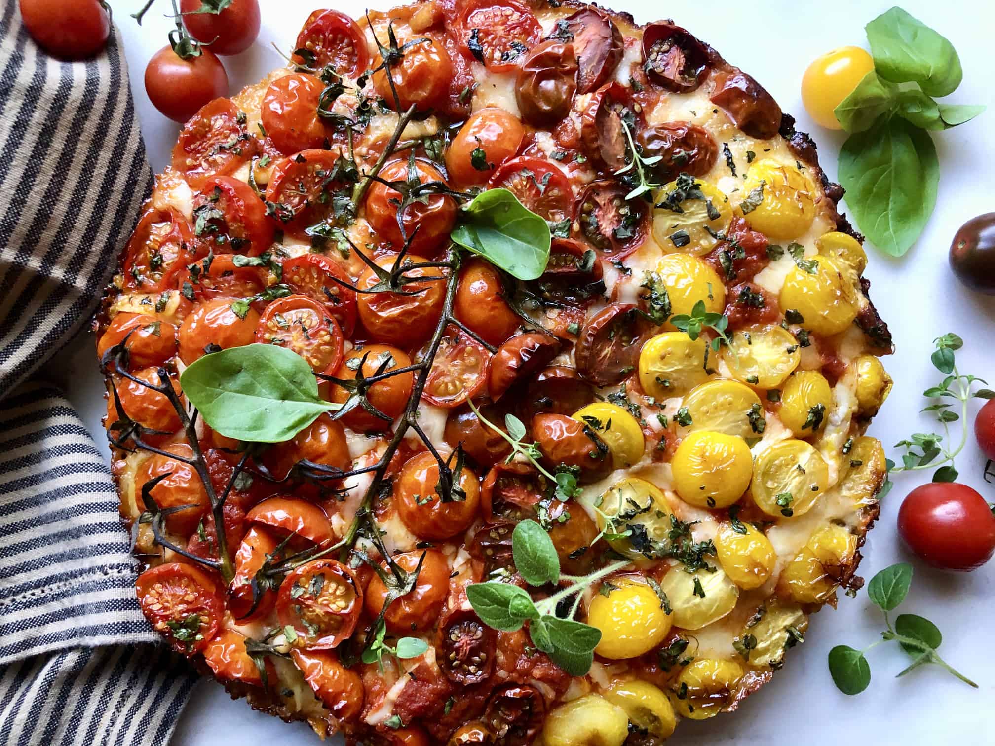 loaded with tomatoes cast iron pizza - a hint of rosemary